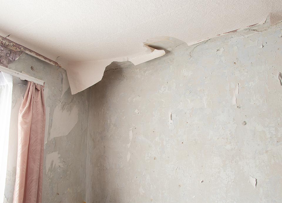 detective drywall behind peeling wallpaper
