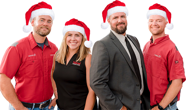 Home Inspector Port Charlotte Team photo of three men and one woman wearing Santa hats